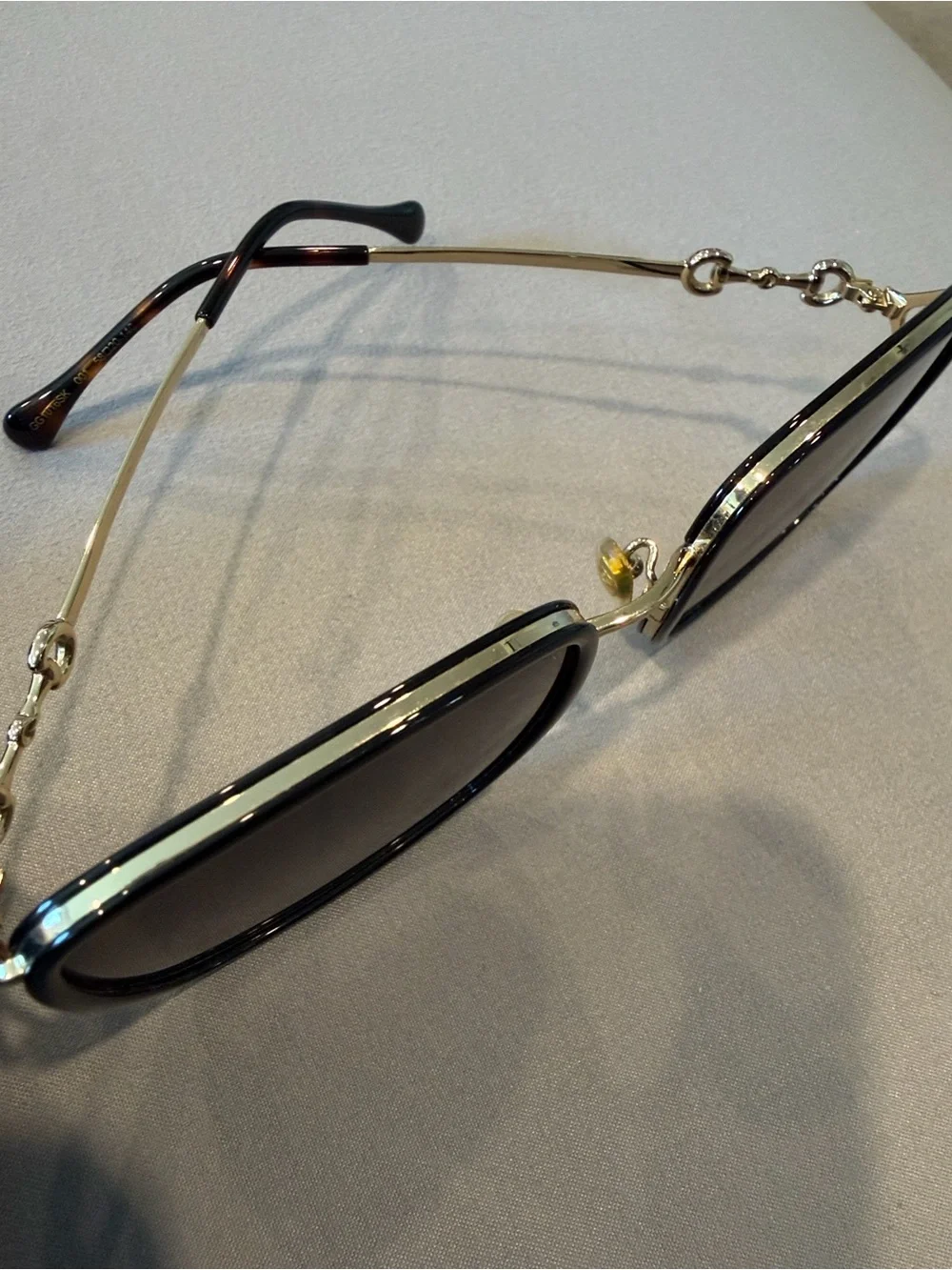 Gucci Black and Gold Oval Sunglasses